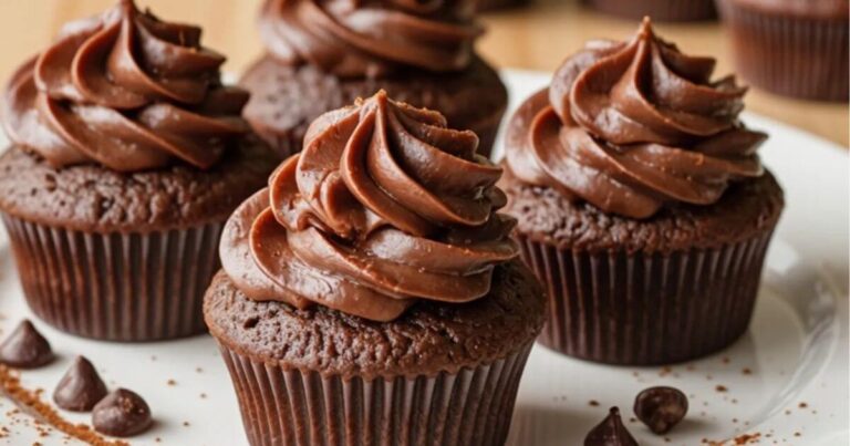Rich and fudgy brownie cupcakes topped with ghanash chocolate, the perfect indulgence for any sweet tooth