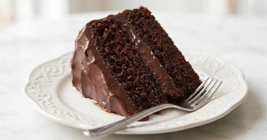 Chocolate Ganache Cake Recipe: Easy, Delicious chocolate cake slice with rich ganache